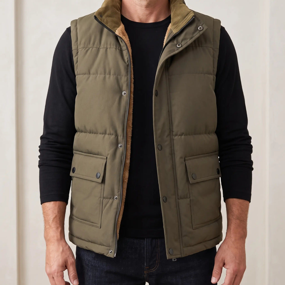 Stand Collar Vest for men in green, padded sleeveless vest worn open over a black tee