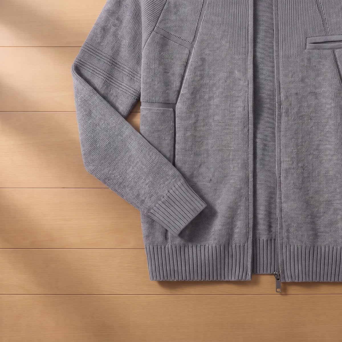 Close up of the STAND COLLAR CARDIGAN ribbed sleeve band, cuff and hem
