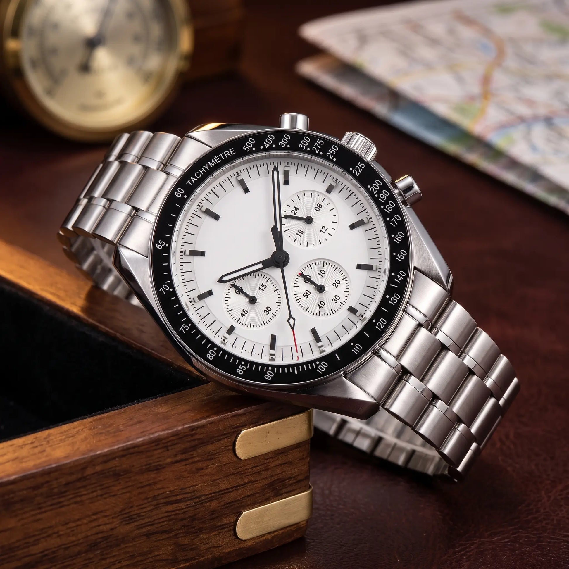 STEEL CHRONOGRAPH WATCH in White - 42mm steel chronograph with white dial, three sub-dials and black tachymetre bezel