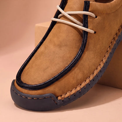 Moc toe and lacing detail of the brown shoe