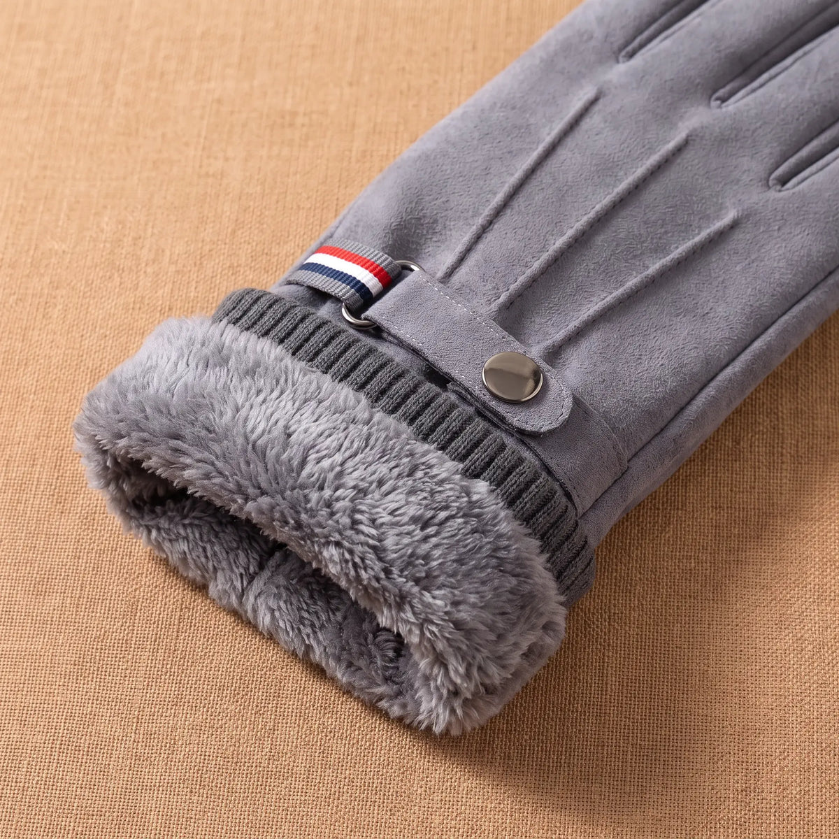 Strap Cuff Gloves in Grey, cuff folded to show the fleece lining