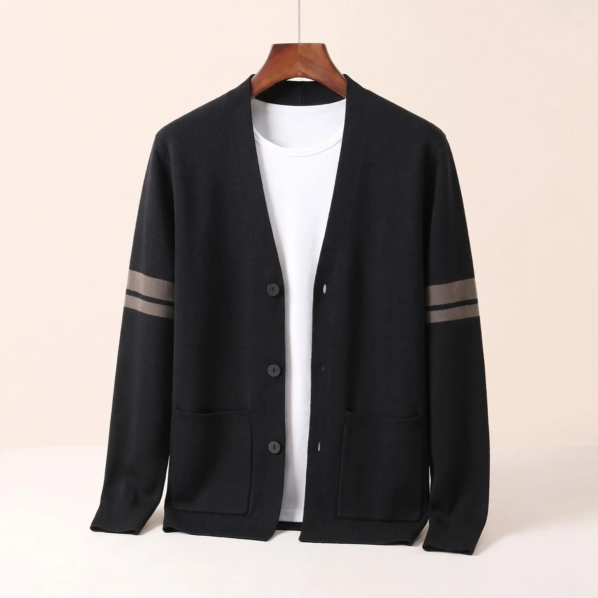 Men's black striped V-neck knit cardigan with three buttons, patch pockets and taupe sleeve stripes