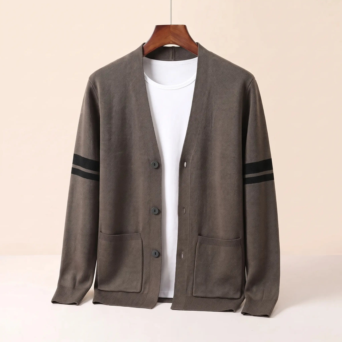 Men's brown striped V-neck knit cardigan with three buttons, patch pockets and black sleeve stripes
