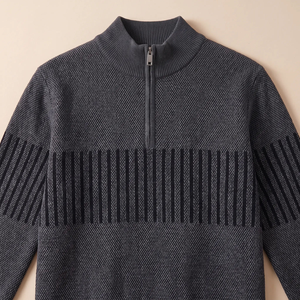 Close up of the STRIPE BAND SWEATER mock neck collar, quarter zip and stripe band