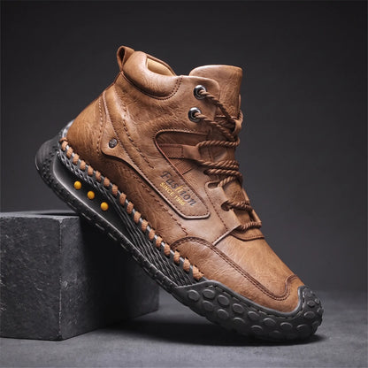 STUDDED SOLE BOOTS in light brown, men's mid-high lace-up boot in washed creased leather with hand-stitched sole edge and studded rubber outsole