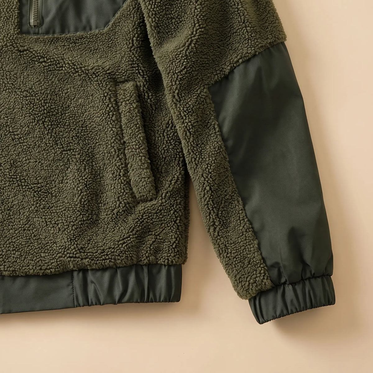 TEDDY FLEECE JACKET close-up of the nylon sleeve panel, cuff and hem band, army green