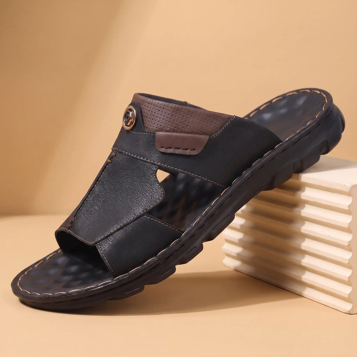 Black mens open toe slide with stitched panels brown emblem tab and lugged sole