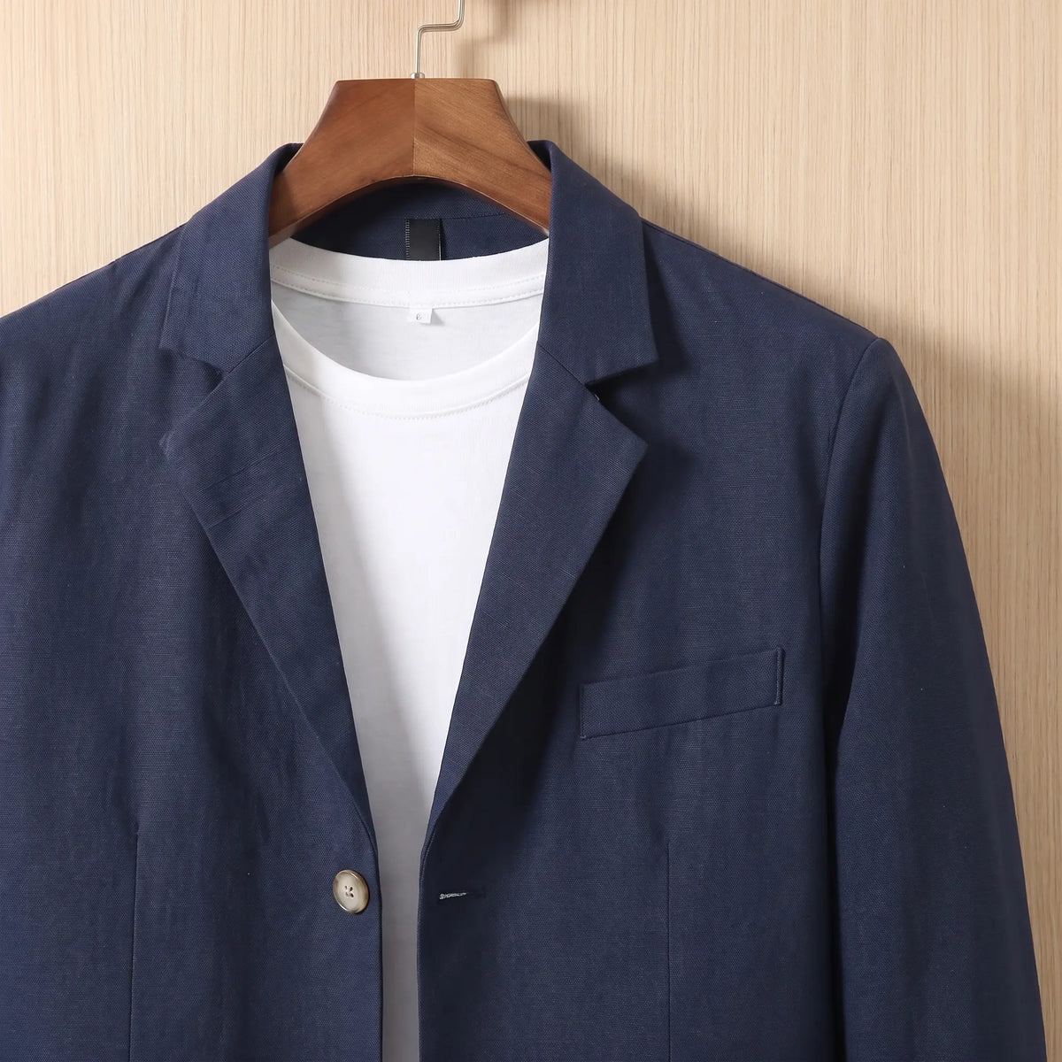 Three Button Blazer in Navy Blue, notch lapel and chest pocket detail