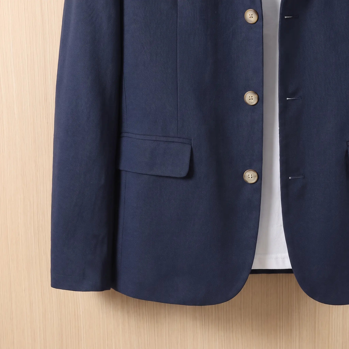 Three Button Blazer in Navy Blue, button front and flap pocket detail