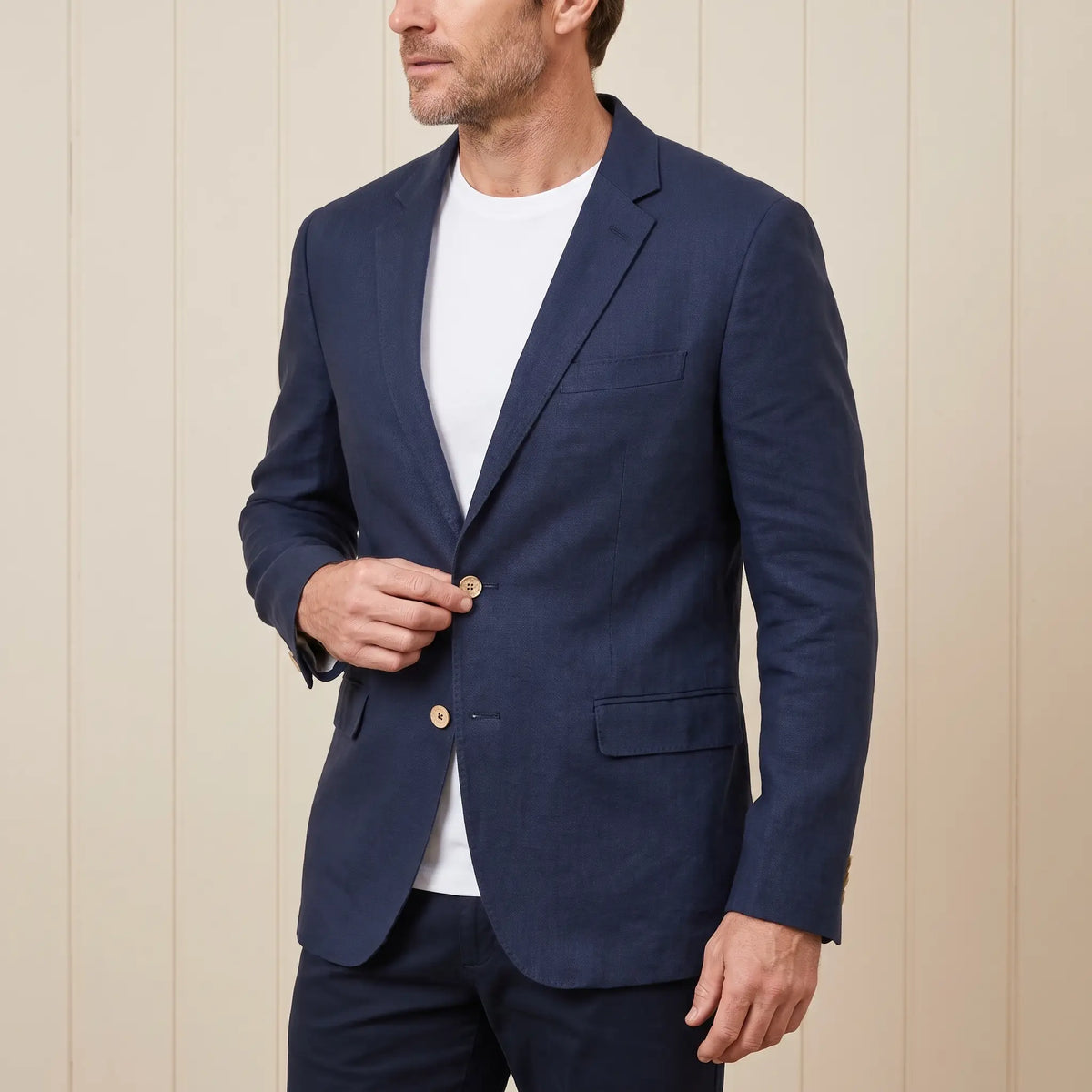 Three Button Blazer in Navy Blue, worn open over a white tee