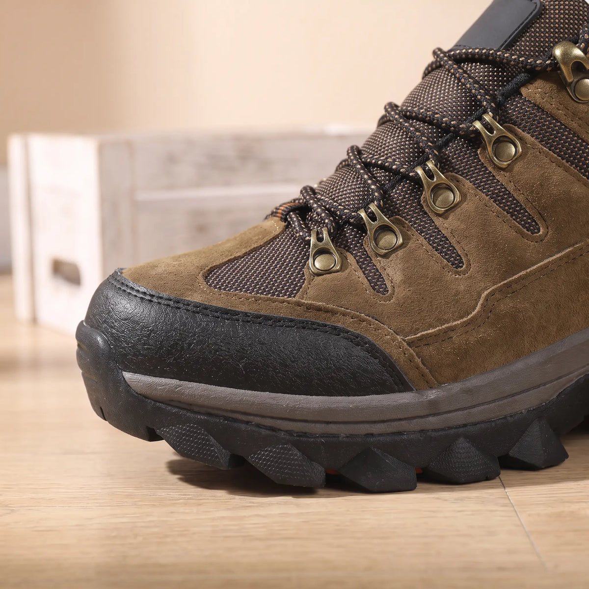 Toe Cap Hiking Shoes in Brown, rubber toe cap and eyelets close-up