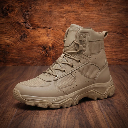 VENTED HIKING BOOTS in khaki, mid top hiking boot with vent holes and chunky lugged sole on a wood floor