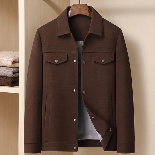 Coffee brown waffle texture shirt jacket on a wooden hanger in a pale wood wardrobe