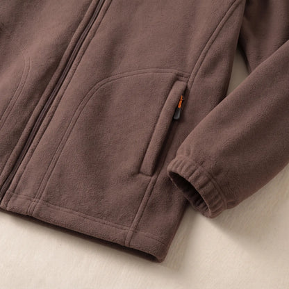 Close up of the WARM LINED FLEECE zip pocket and hem