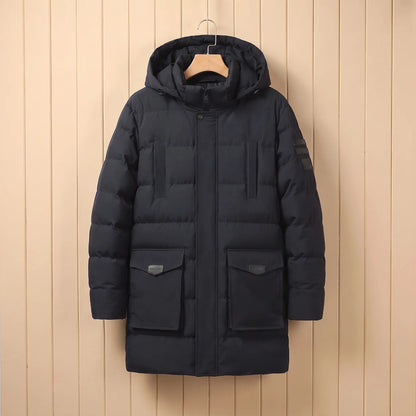 Men's black quilted padded winter coat with hood, snap placket and large flap pockets on a wooden hanger