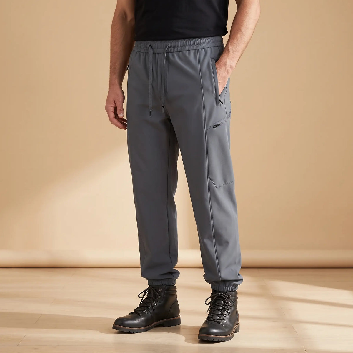 WARM TRAIL JOGGERS in gray, men's fleece-lined softshell joggers with zip pockets and cuffed hems