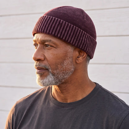 Red washed knit beanie for men with a deep ribbed turn-up cuff