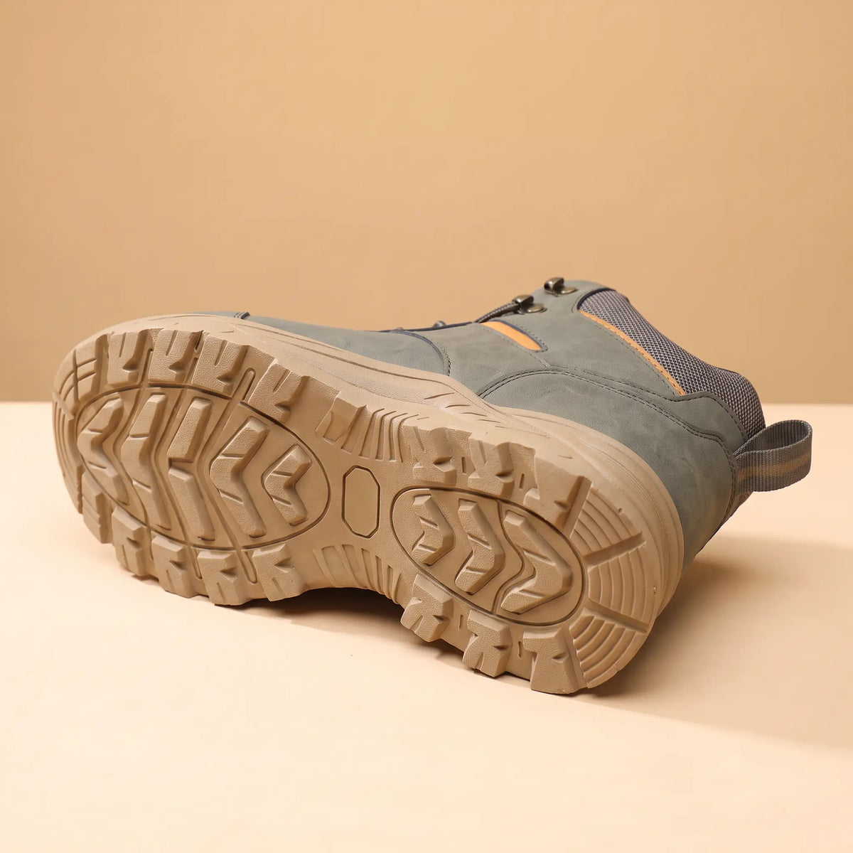 Rugged tread sole of green waterproof hiking boots for men