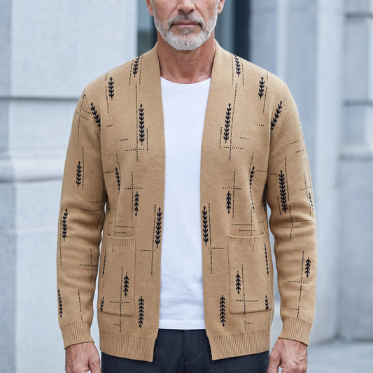 Man wearing the Wheat Knit Cardigan in khaki, an open-front knit cardigan with a black wheat pattern, over a white tee