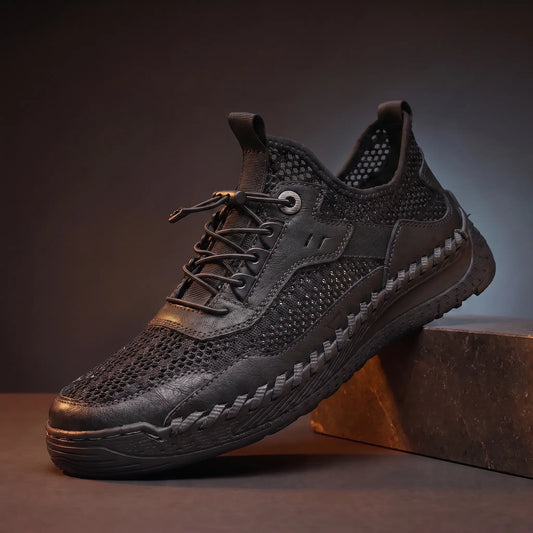 Black breathable mesh walking sneakers with dark whipstitch sole band