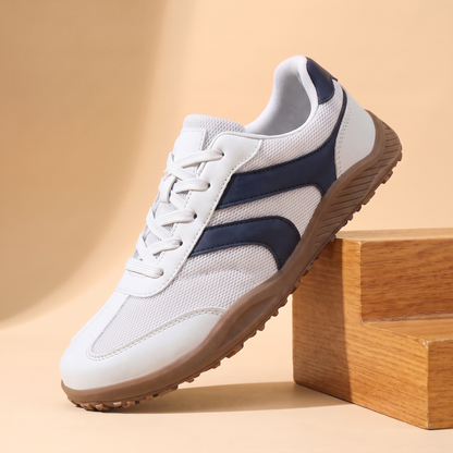 Wide Toe Trail Sneakers in white with navy blue side stripes and gum sole
