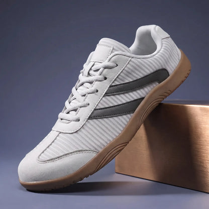 Gray wide toe barefoot sneakers with charcoal stripes and thin gum rubber sole