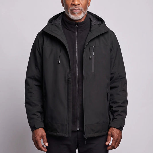 Men's black waterproof hooded hiking jacket worn open over a black zip-in fleece