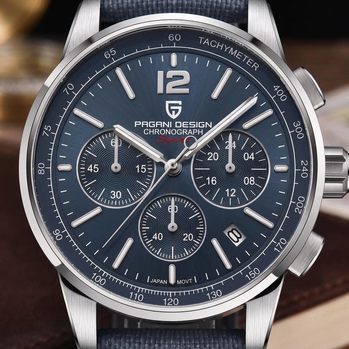 WOVEN STRAP CHRONOGRAPH Silver Blue dial close-up - three subdials, tachymeter scale and date window