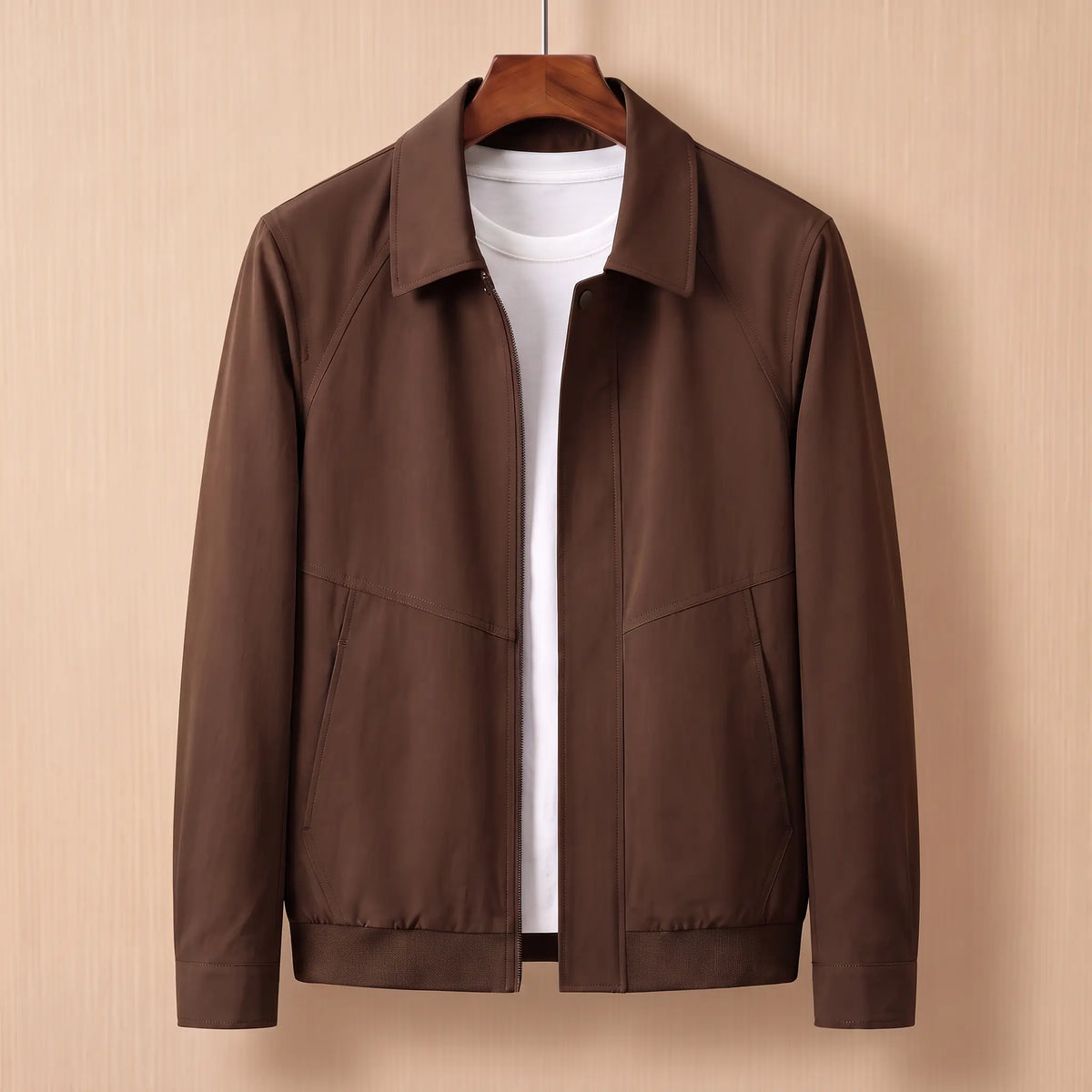 Zip front harrington jacket in brown on a wooden hanger