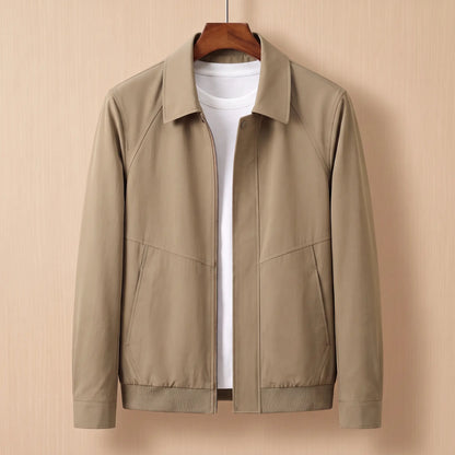 Zip front harrington jacket in khaki on a wooden hanger