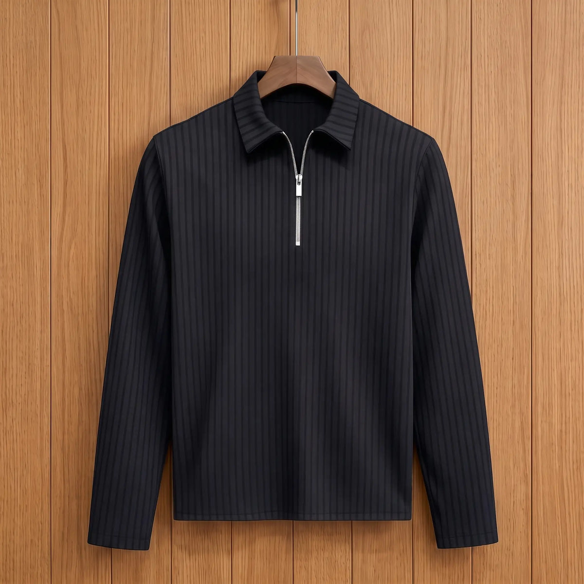 Men's black long-sleeve rib-knit zip neck polo with pointed collar on a wooden hanger
