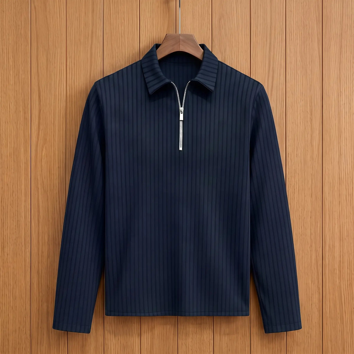 Men's navy blue long-sleeve rib-knit zip neck polo with pointed collar on a wooden hanger
