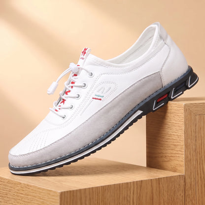 SMART CASUAL SNEAKERS white casual leather sneaker on a light oak platform, warm daylight