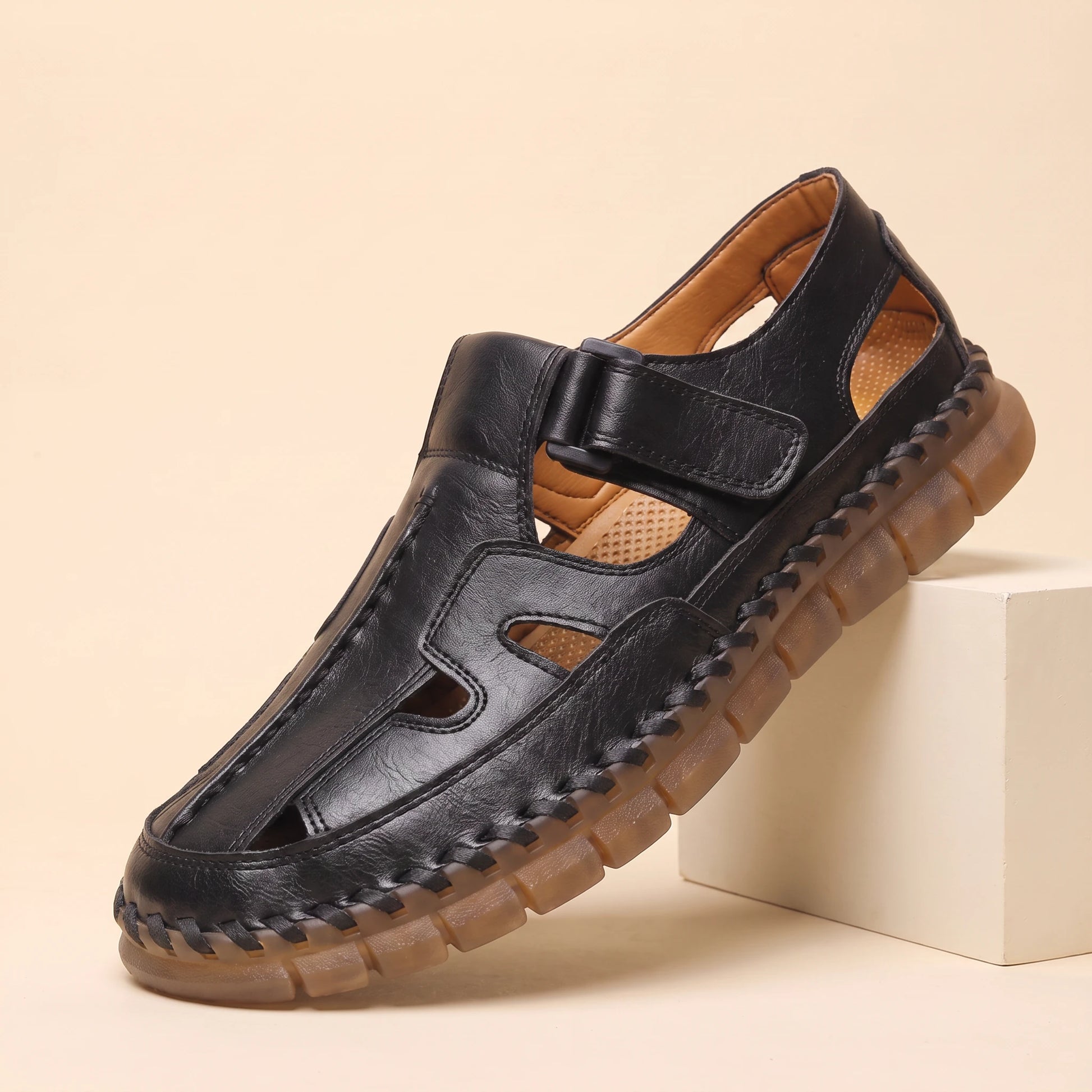 Adjustable Strap Sandals black perforated leather fisherman sandal
