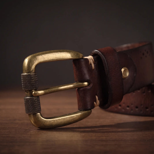 Antique brass belt buckle and keeper loop detail