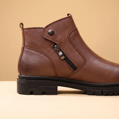 SHARP ZIP ANKLE BOOTS close-up of the thick rugged lug sole