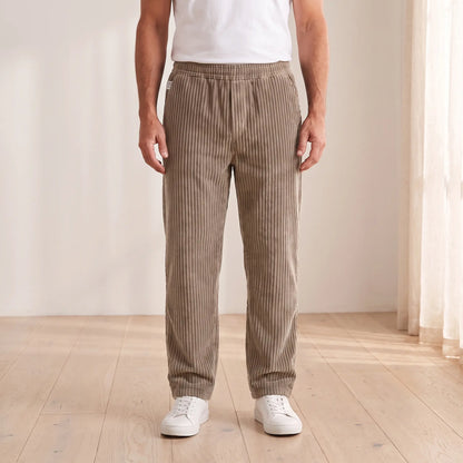 Men's khaki wide wale corduroy loose straight trousers with elastic waist, worn