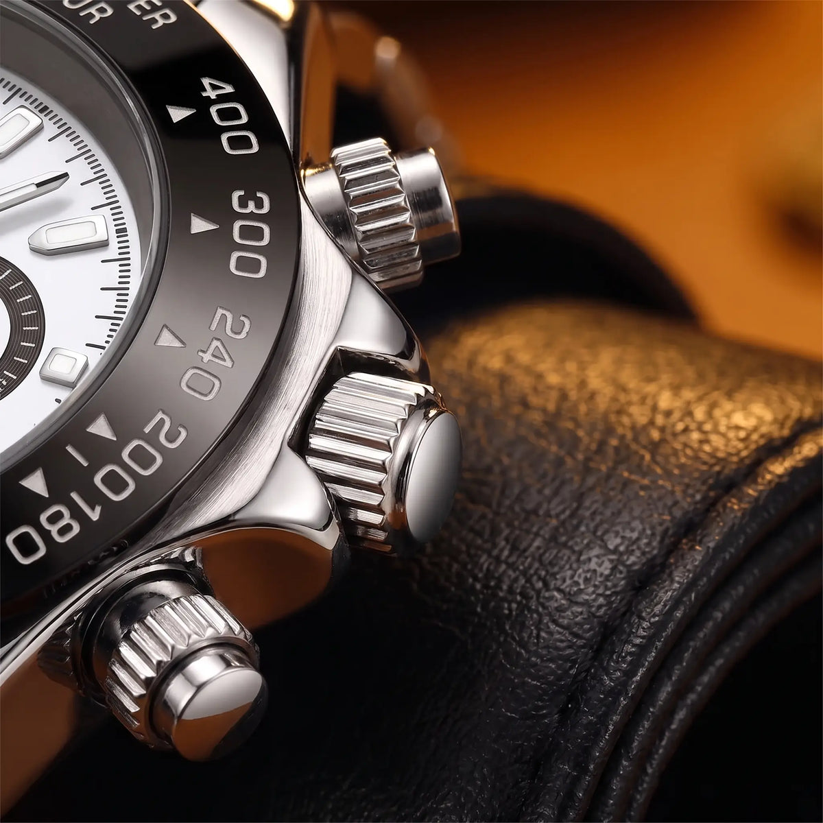 Close up of the ridged crown, two buttons and engraved black bezel on the Black Bezel Watch