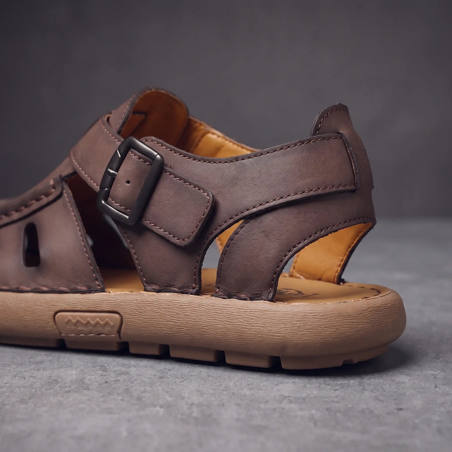 Roman sandal buckle heel and sole detail