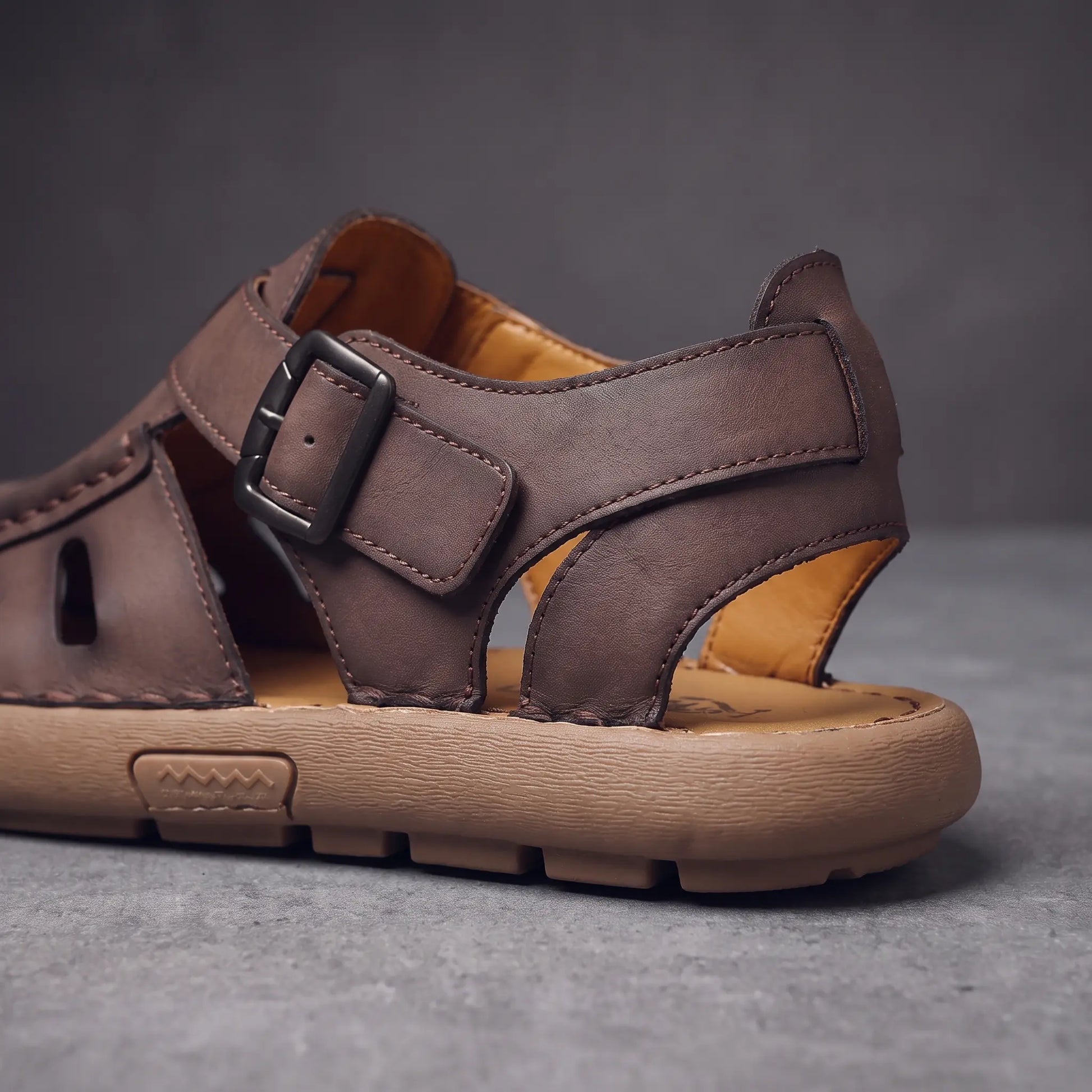 Roman sandal buckle heel and sole detail