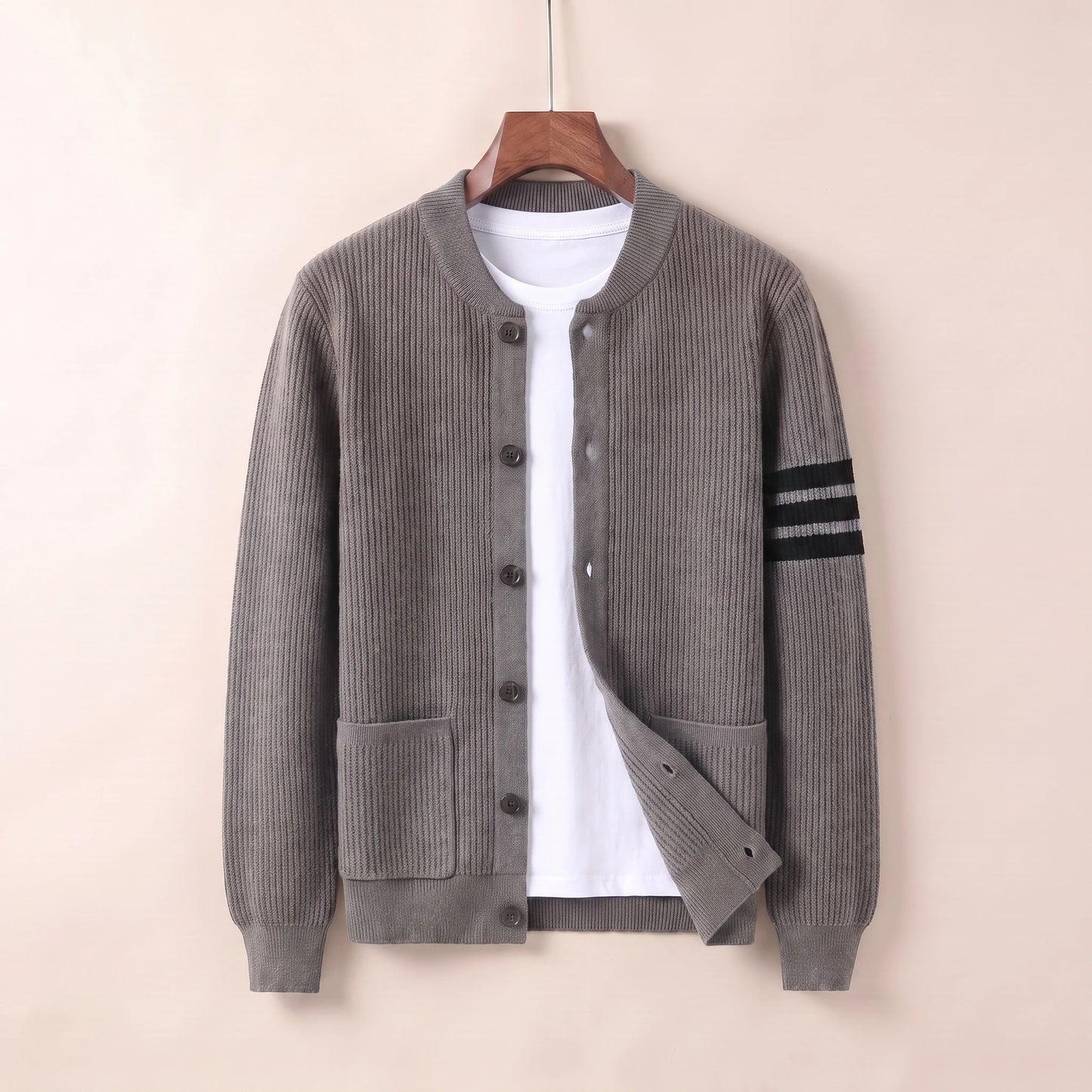 Gray knit button cardigan coat on hanger