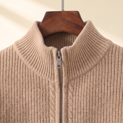 Close up of the stand collar and metal zip pull on the khaki Cold Weather Cardigan