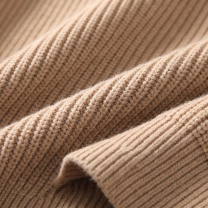 Close up of the thick ribbed knit texture and cuff on the khaki Cold Weather Cardigan