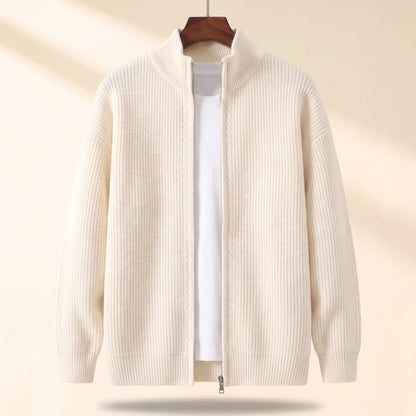 Cold Weather Cardigan in white, a thick ribbed knit full zip cardigan jacket with a stand collar on a wooden hanger