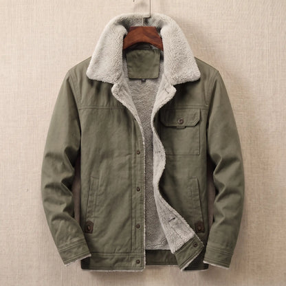 Green cotton canvas sherpa lined jacket on a wooden hanger