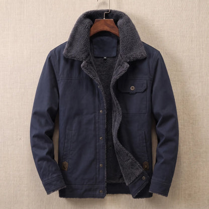 Navy cotton canvas sherpa lined jacket on a wooden hanger