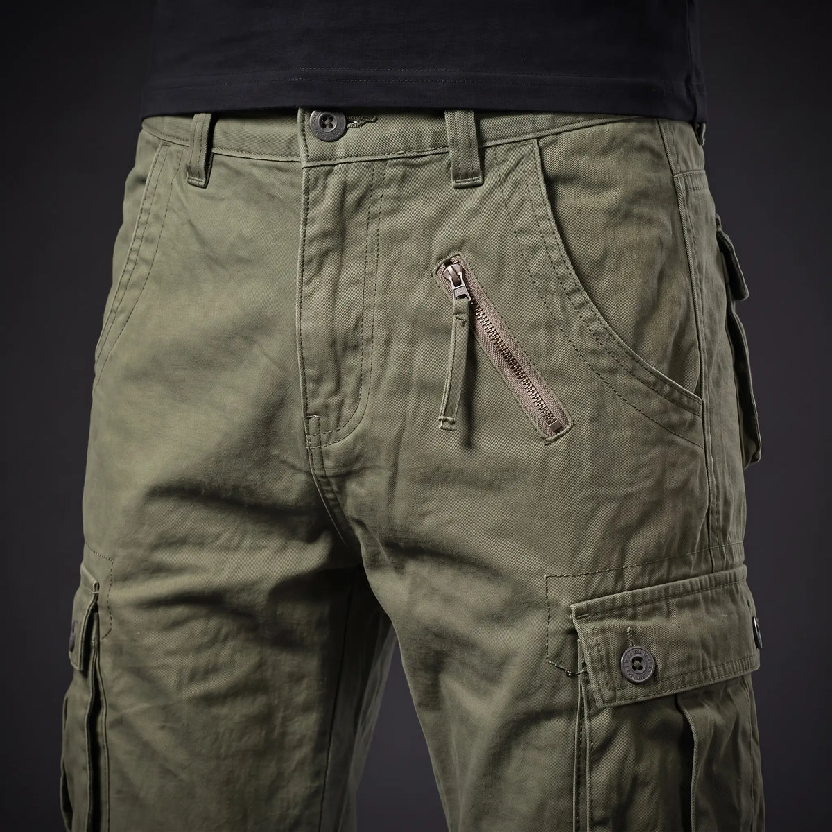 Close up of the waistband, fly and zip hip pocket