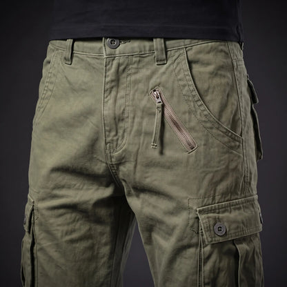 Close up of the waistband, fly and zip hip pocket