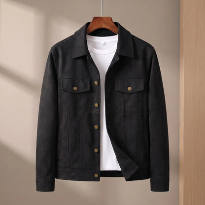 Black suede lapel jacket on wooden hanger