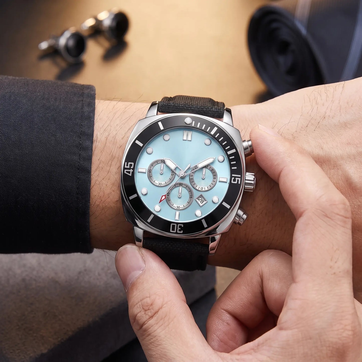 Diver bezel watch being fastened on the wrist
